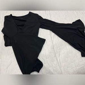Black bell sleeve crop top.
